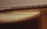 elevated fretboard